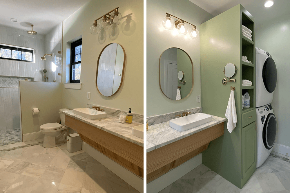 A modern bathroom featuring a shower area, dual vanities with a marble countertop, and a compact laundry nook.